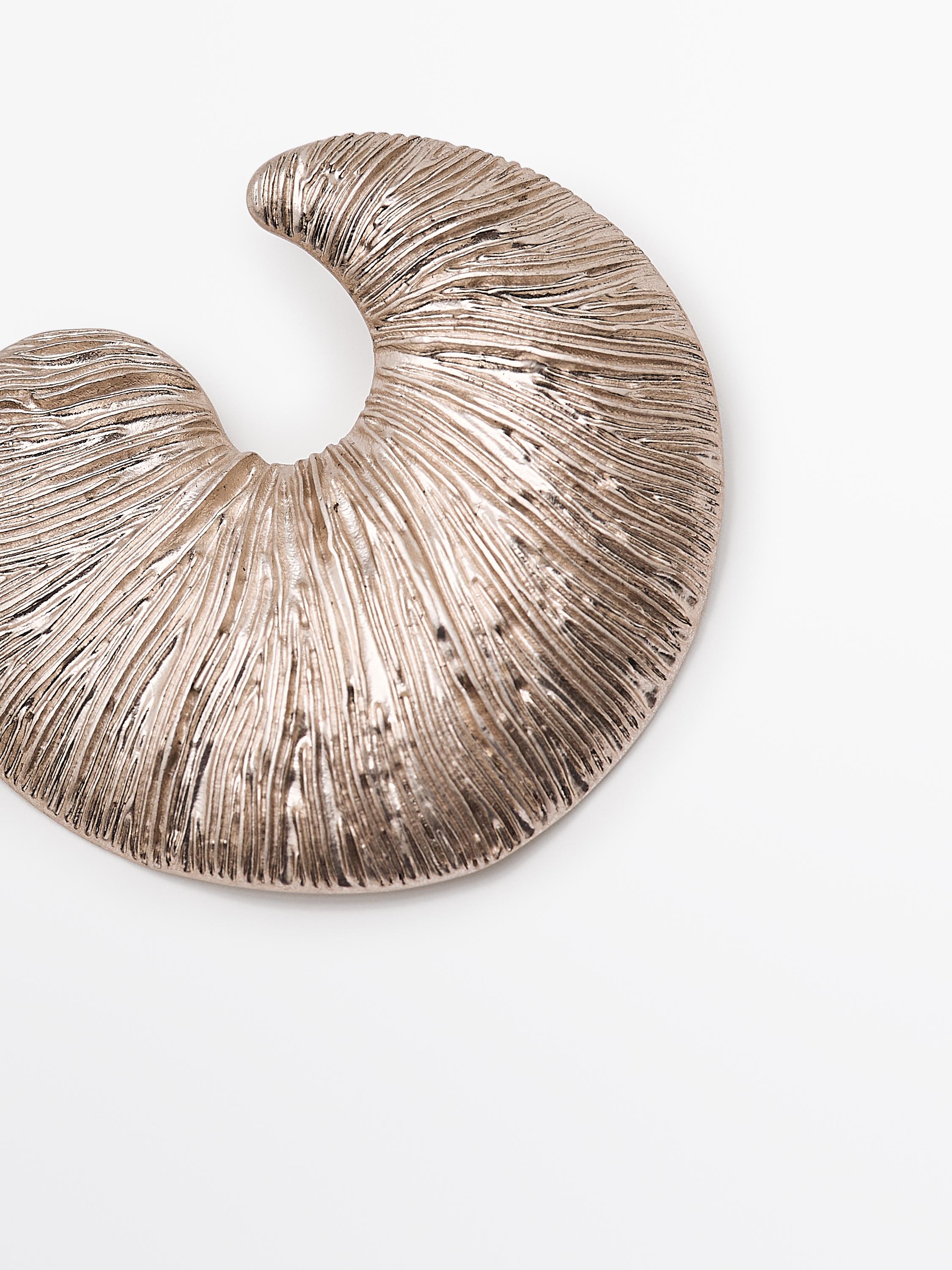 Fossil hoop earrings